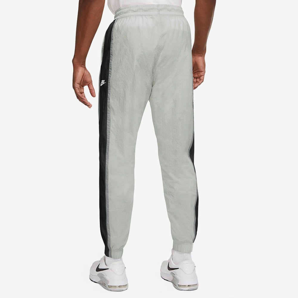 Штаны Nike M Nsw Wvn Lined Pant SNL CB 
