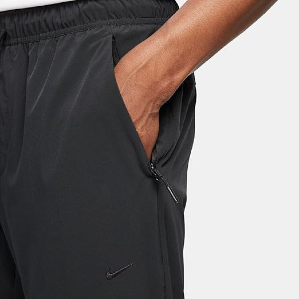 Штани (костюм) чоловічі Nike Dri-Fit Unlimited Tapered Leg Versatile Training Pants Black