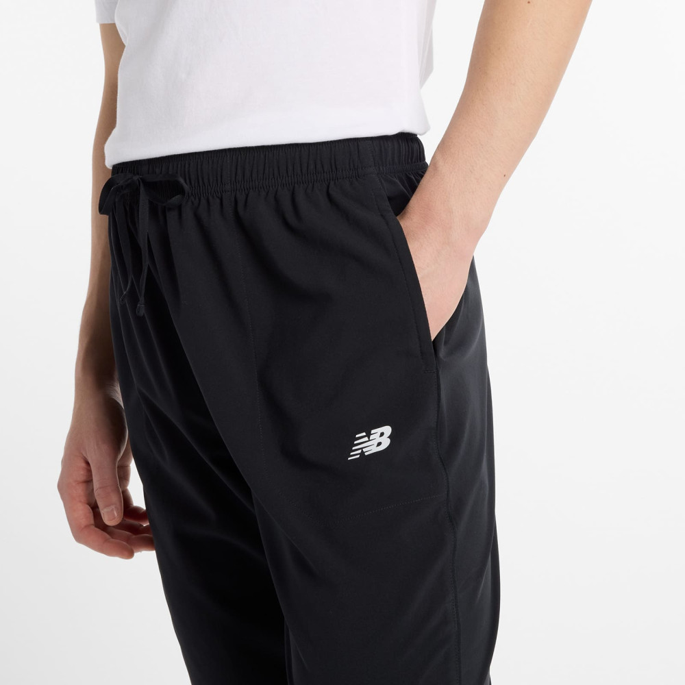 брюки NewBalance муж. sport woven черн.